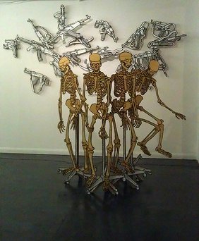 "Yellow Skeleton on stand" and "AK47" drawings at the Ground Floor Left gallery.